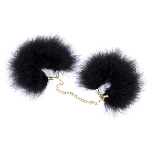 "Fuzzy Wuzzy's Not Free”
Black fur-lined cuffs that match your tail plug. Wiggle all you want. Mistress loves when her toys squirm.