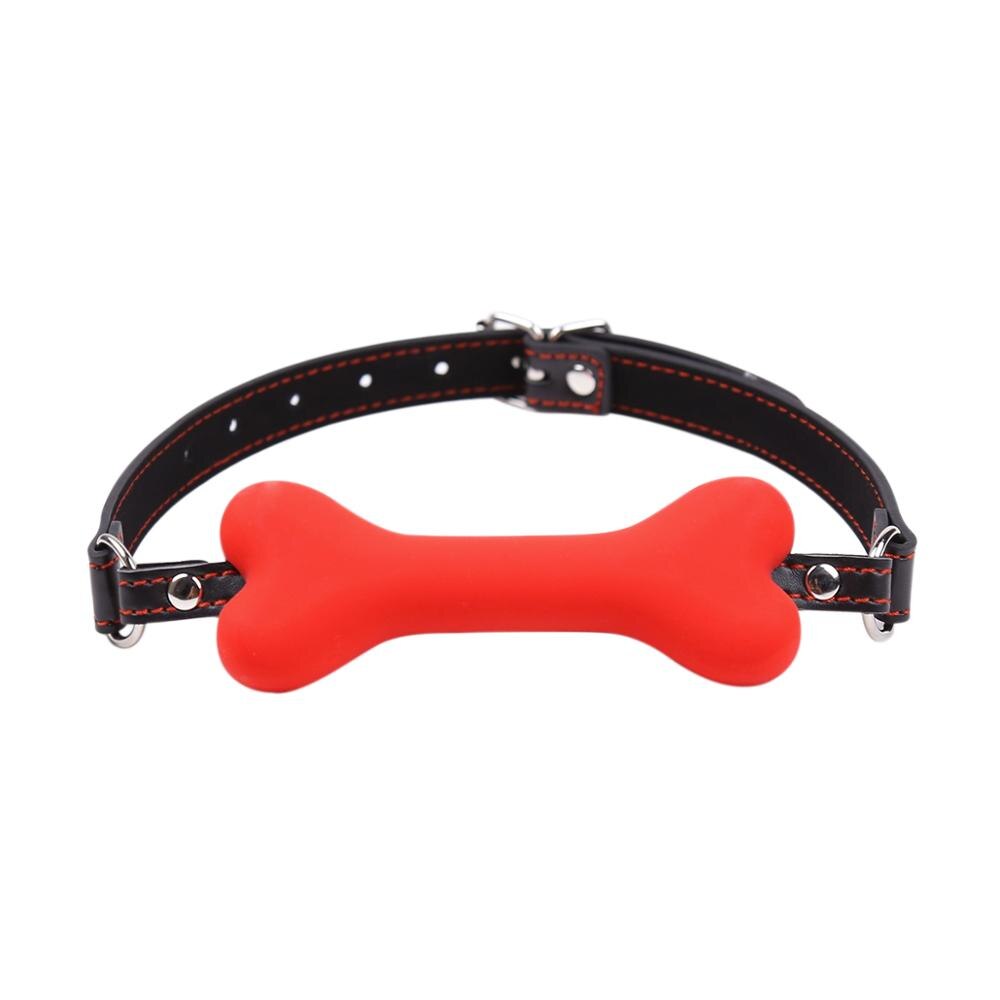 "Gagged by Obedience" – Ball Gag with Bone
No silly ball. You chew this bone while remaining blissfully muted. A constant reminder: your noise is a privilege, not a right.