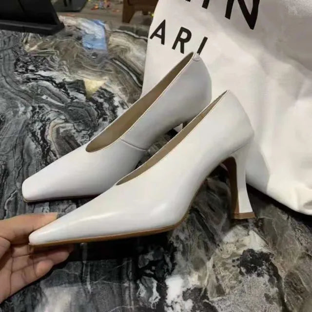 "The Correctional Heel"
Too clumsy? Good. These are punishment shoes. Practice until your strut pleases me