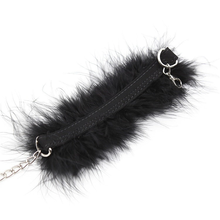 "Fuzzy Wuzzy's Not Free”
Black fur-lined cuffs that match your tail plug. Wiggle all you want. Mistress loves when her toys squirm.