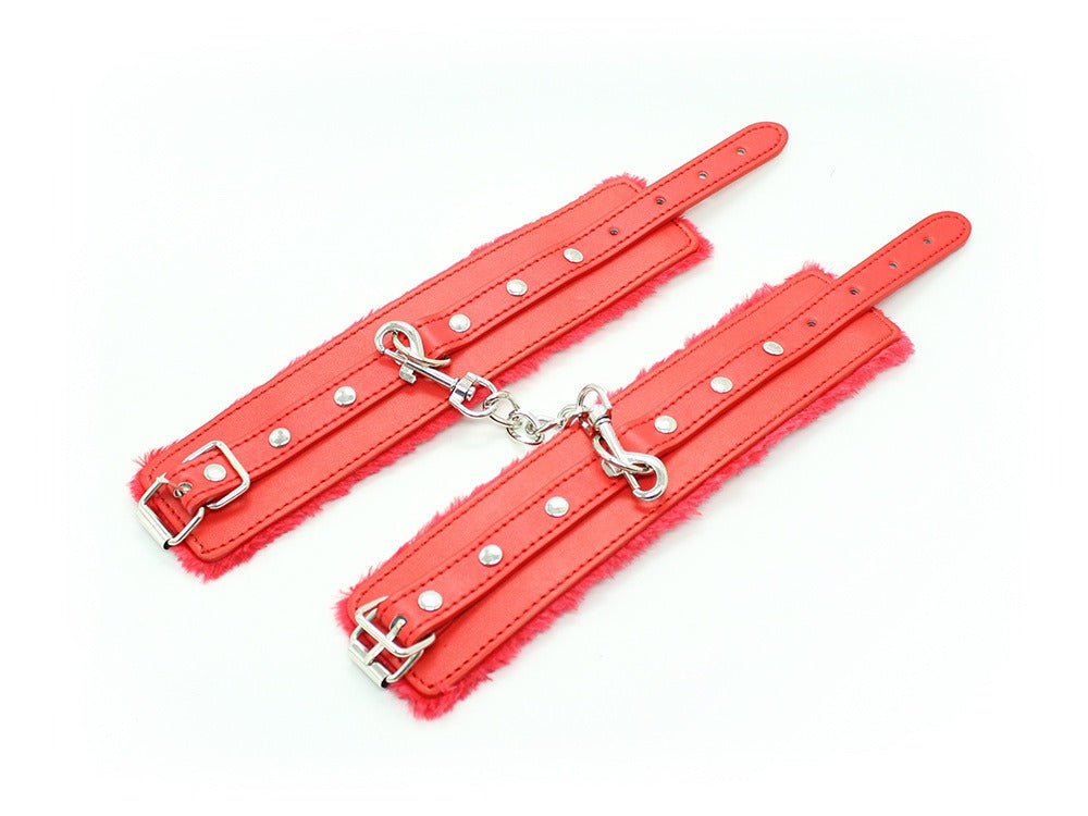 “Scarlet Silken Shackle” – Red leather handcuffs for soft wrists. Wriggle all you want—you’re staying right there for Mistress.
(Other colors available)