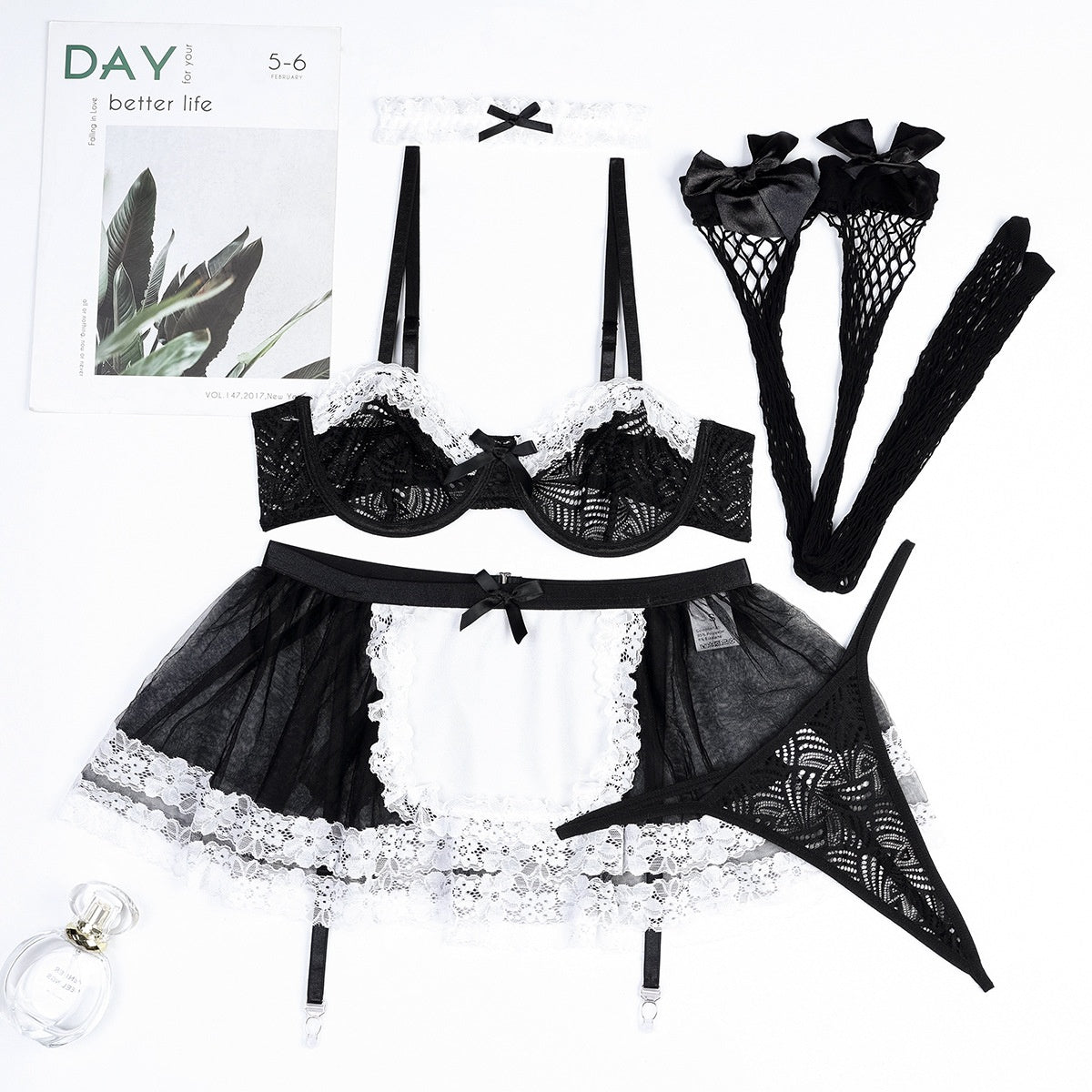 “Chores & Chastity”
Sheer black and white maid lingerie with an open back, thigh-high stockings, and a bell choker. Includes a “Good Girl” tag you haven’t earned yet. Put it on, grab the feather duster, and try not to make a mess—unless I tell you to.