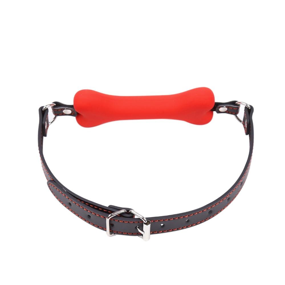 "Gagged by Obedience" – Ball Gag with Bone
No silly ball. You chew this bone while remaining blissfully muted. A constant reminder: your noise is a privilege, not a right.