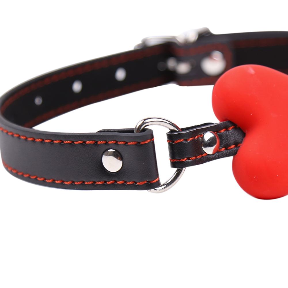 "Gagged by Obedience" – Ball Gag with Bone
No silly ball. You chew this bone while remaining blissfully muted. A constant reminder: your noise is a privilege, not a right.