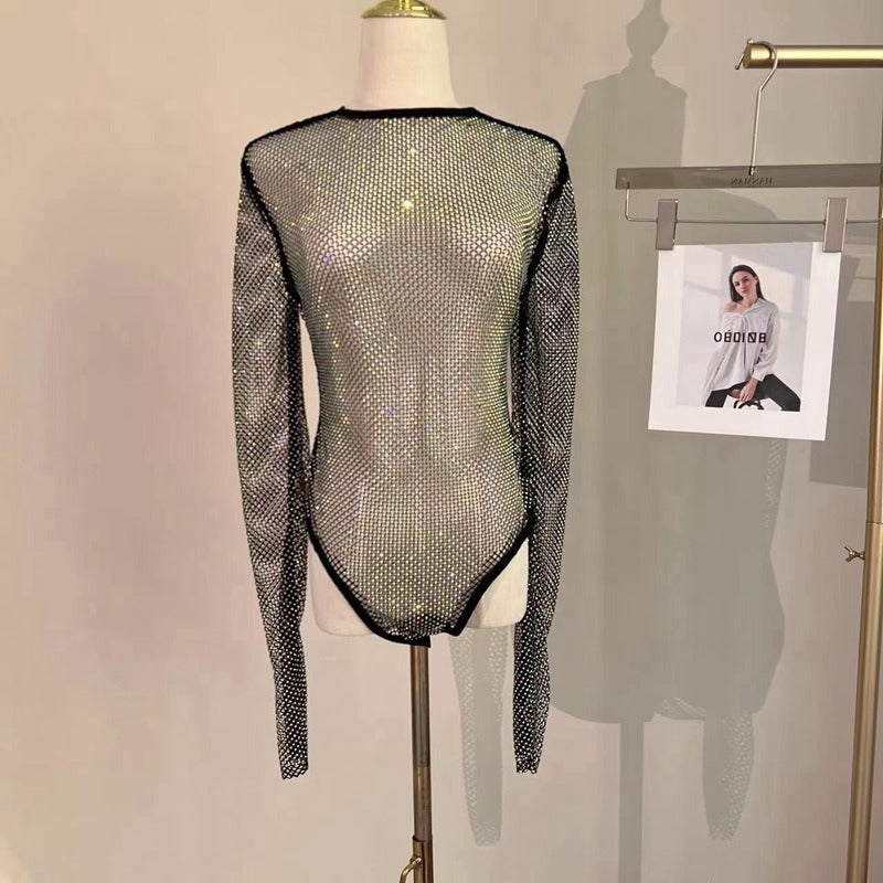 “Mistress’s Mesh Doll”
Black fishnet full-body suit with floral detailing and open chest. Nothing to hide, nothing to protect. Just a pretty little puppet on display.