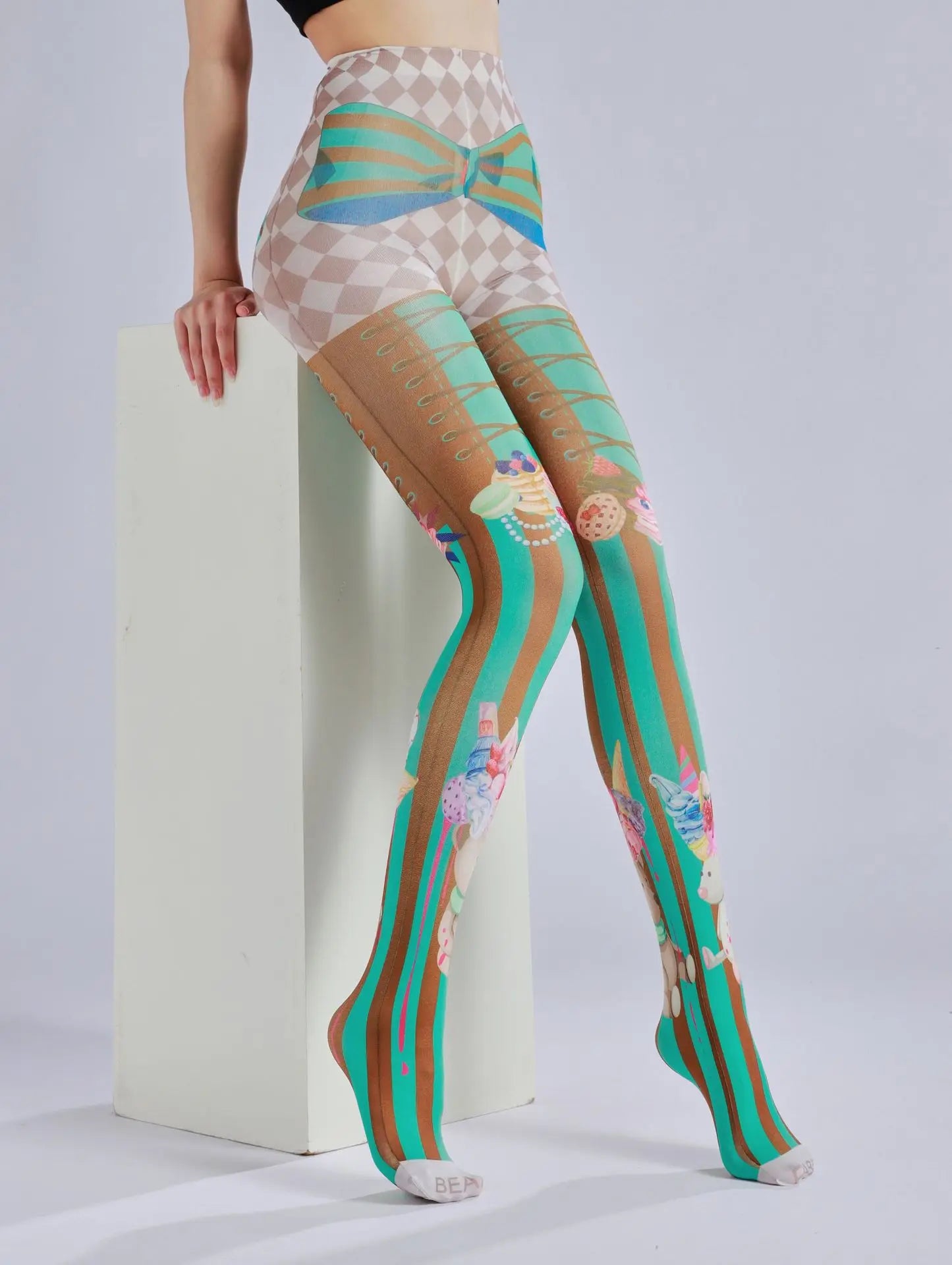 “Ice Cream Knees” – Adorable pastel tights with ice cream sprinkles printed right on your thighs. You’ll twirl because you’re sweet like cotton candy, pet.