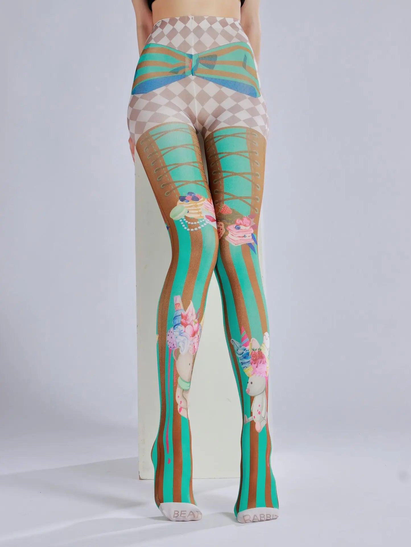 “Ice Cream Knees” – Adorable pastel tights with ice cream sprinkles printed right on your thighs. You’ll twirl because you’re sweet like cotton candy, pet.